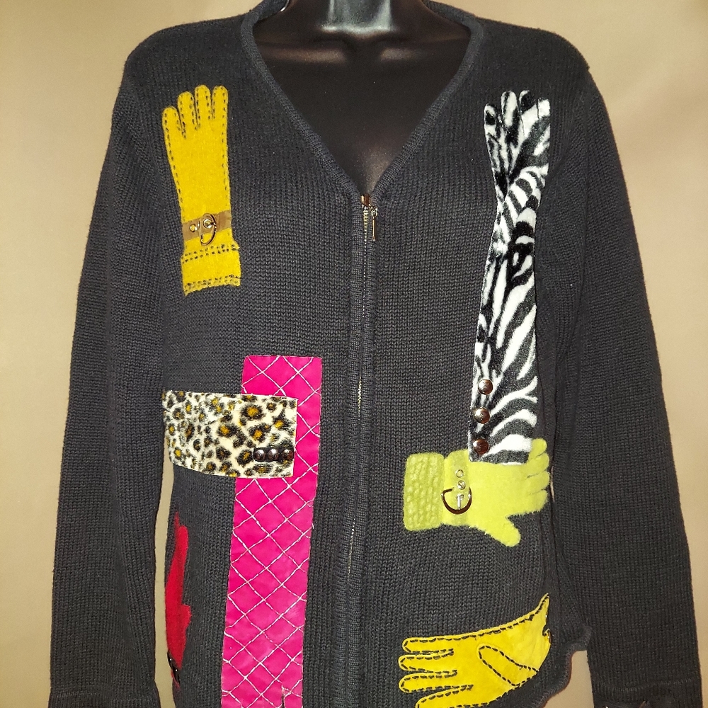 Black sweater with multi color glove decor